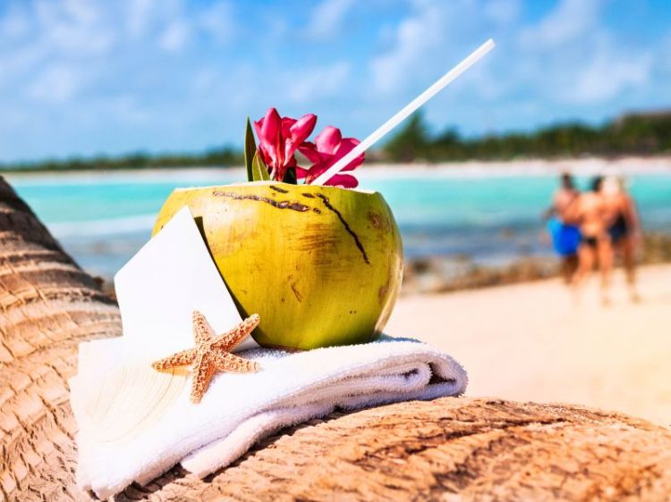 Coconut drink on a beach